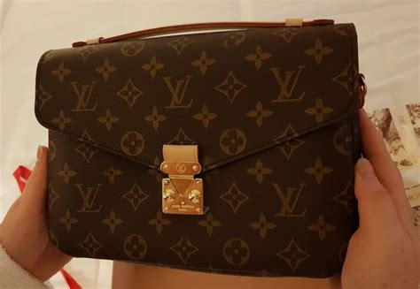 como reconocer un bolso louis vuitton original|carteras louis vuitton.